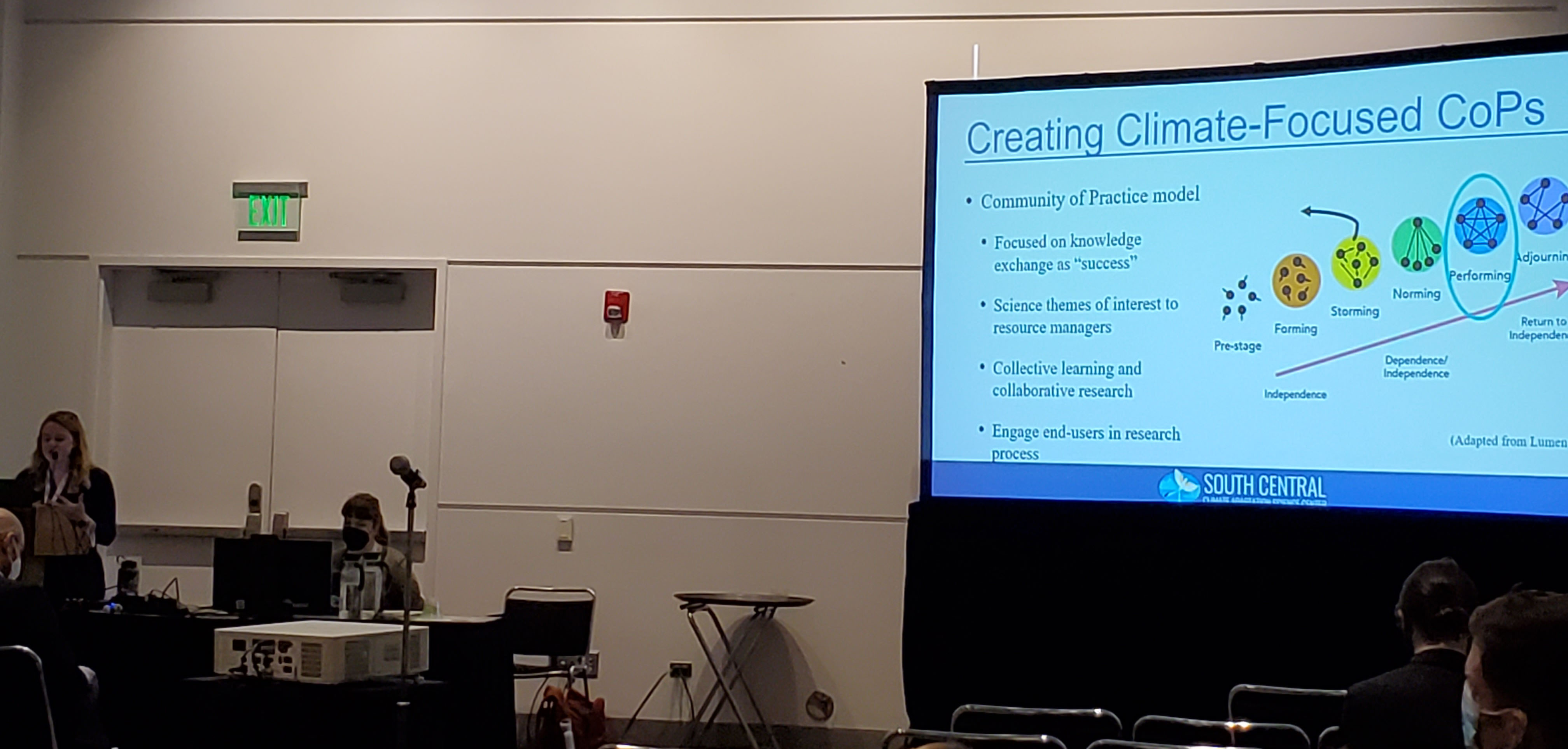 Emma presenting during AMS 2023