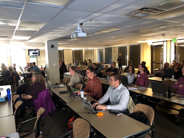 Looking across a classroom at workshop participants