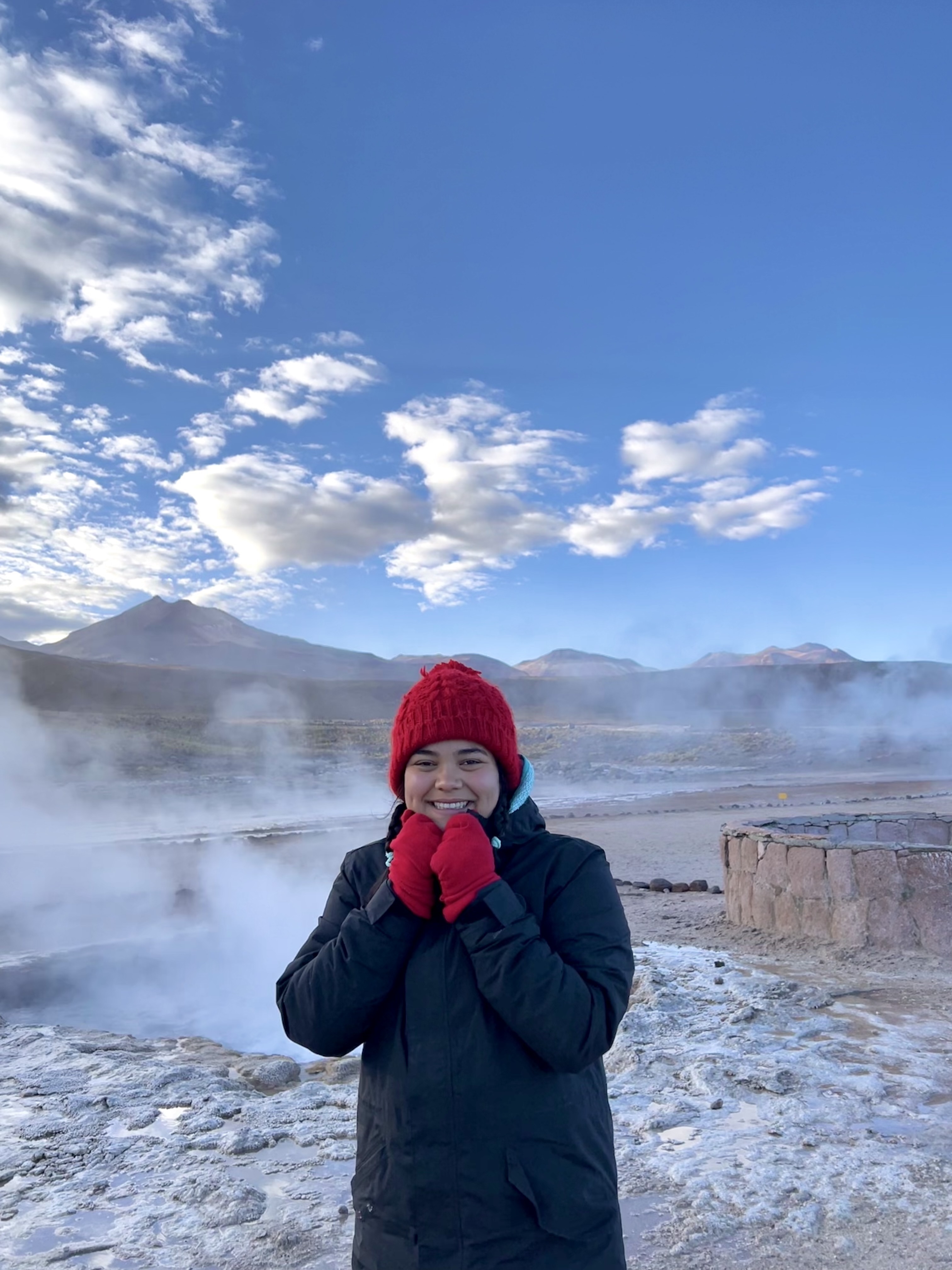 Suraya Yamada-Sapien poses near a hot springs area