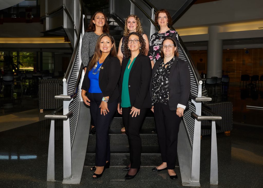 Six members of the project team pose